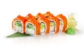 Philadelphia rolls with salmon and red caviar served on bamboo leaf Royalty Free Stock Photo