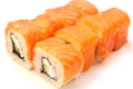 Philadelphia rolls with salmon soy sauce on a white