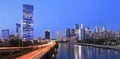 Philadelphia skyline illuminated at dusk and Schuylkill River