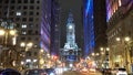 Philadelphia street view by night with City Hall - PHILADELPHIA, UNITED STATES - APRIL 7, 2017