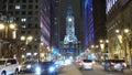 Philadelphia street view by night with City Hall - PHILADELPHIA, UNITED STATES - APRIL 7, 2017