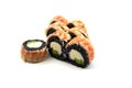 Philadelphia Sushi Roll made of Fresh shrimp, Avocado and Cream Cheese with black rice with cuttlefish ink inside. Japanese Royalty Free Stock Photo