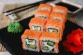 Philadelphia sushi roll set with ginger and wasabi