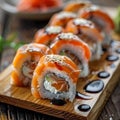 Philadelphia Sushi Rolls Set, Uramaki, Nori Maki or Futomaki Sushi with Raw Fish Fillet on Wood Royalty Free Stock Photo