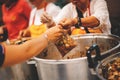 Philanthropists donate food and help the poor : concept of feeding Royalty Free Stock Photo