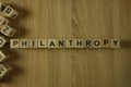 Philanthropy word from wooden blocks