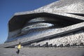 The Philharmonie de Paris Building and Young Woman