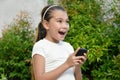 Philippina Child And Excitement Using Cell Phone