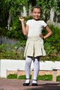 Philippina Child And Happiness Wearing Skirt Standing On Sunny Day