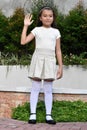 Philippina Girl Pledging Allegiance Standing In Park