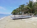 Philippine bangka boat on tropical beach Royalty Free Stock Photo