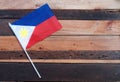 Philippine Flag Top View on a Rustic Wood table