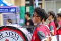 Philippine marching band member playing his bass drum