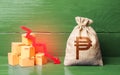 Philippine peso money bag with boxes and down arrow. Income decrease, slowdown and decline of economy. Low sales. Production Royalty Free Stock Photo