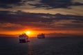 A sunset over Manila bay with cruise ships anchored in the foreground. Royalty Free Stock Photo