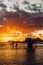 Philippines. Local boat`s silhouette at the bay. Sunset sky. Royalty Free Stock Photo