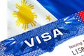 Philippines Visa in passport. USA immigration Visa for Philippines citizens focusing on word VISA. Travel Philippines visa in Royalty Free Stock Photo