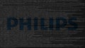 Philips logo made of source code on computer screen. Editorial 3D rendering