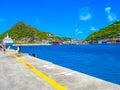 Philipsburg, Sint Maarten - February 10, 2013: Tourists at Dr. Wathey Pier on the Dutch side of St. Maarten