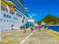 Philipsburg, Sint Maarten - February 10, 2013: Tourists at Dr. Wathey Pier on the Dutch side of St. Maarten