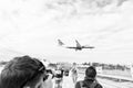 Philipsburg, Sint Maarten - January 24, 2016: vacation on maho beach at Caribbean. Plane low fly over people. Jet flight