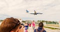 Philipsburg, Sint Maarten - January 24, 2016: vacation on maho beach at Caribbean. Plane low fly over people. Jet flight