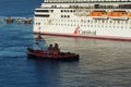 Stern of Carnival Magic which is a Dream-class cruise ship moored in port of Philipsburg in Caribbean Island Sint Maarten.