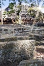 Phimeanekas temple or Vimeanakas ruin at Angkor is a Hindu temple, 10th century, Siem reap,Cambodia. Focus on a stone in the fo