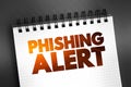 Phishing Alert text quote on notepad, concept background Royalty Free Stock Photo