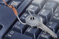 Phishing, hacking personal data and money , key and hook on computer keyboard Royalty Free Stock Photo