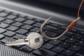 Phishing personal data , key and hook on computer keyboard