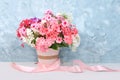 Phlox flowers in a vase, abstract floral arrangement, spring or autumn background with place for text, minimal holiday concept,