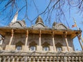 Female figures appear to hold up the roof of the main hall at Phnom Bros Pagoda-, Cambodia Royalty Free Stock Photo