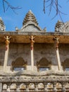 Female figures appear to hold up the roof of the main hall at Phnom Bros Pagoda-, Cambodia Royalty Free Stock Photo