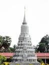 White stupa on the grounds of Silver Pagoda complex, a Buddhist temple inside the Royal