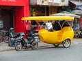 PHNOM PENH, CAMBODIA - MARCH 18, 2015 : Phnom penh Tuk-tuk taxi Royalty Free Stock Photo