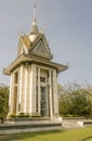 Visitor outside memorial stupa in Choeung Ek killing field in Phnom Penh in Cambodia