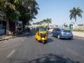 Phnom Penh, Cambodia - 12 26 2019 : Tuk-Tuk driving on road Royalty Free Stock Photo