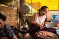 Image of a Khmer rural women girl in the countryside cooking in Cambodia.