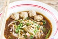 Pho Tai style noodle soup with vegetables on table Royalty Free Stock Photo