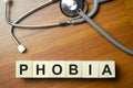 PHOBIA word made on wooden cube blocks