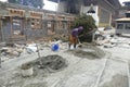 Workers restoring cells of the Gangtey Gompa