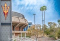 Phoenix, Arizona, USA - 3.23.2024: Focus on Sundevil logo with distant view of Arizona State University Desert Financial Royalty Free Stock Photo