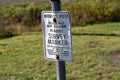 US Coast and Geodetic Survey Marker showing elevation - sign asking not to disturb