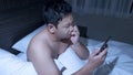 Phone Addicted, Man Using Smart Phone on Bed at Midnight