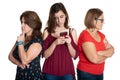 Phone addicted teenage girl with her worried mother and grandmother