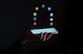 Phone app hologram, hand and mobile networking with software and digital transformation. 3d digital animation, night and