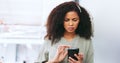 Phone, black woman and frustrated frown of a person on digital communication reading fake news. Annoyed woman on web Royalty Free Stock Photo