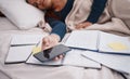 Phone, books and sleeping woman student tired from learning, studying and education exam paper in bed. University or