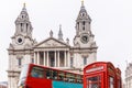 Phone box and Saint Pauls cathedral in winter day Royalty Free Stock Photo